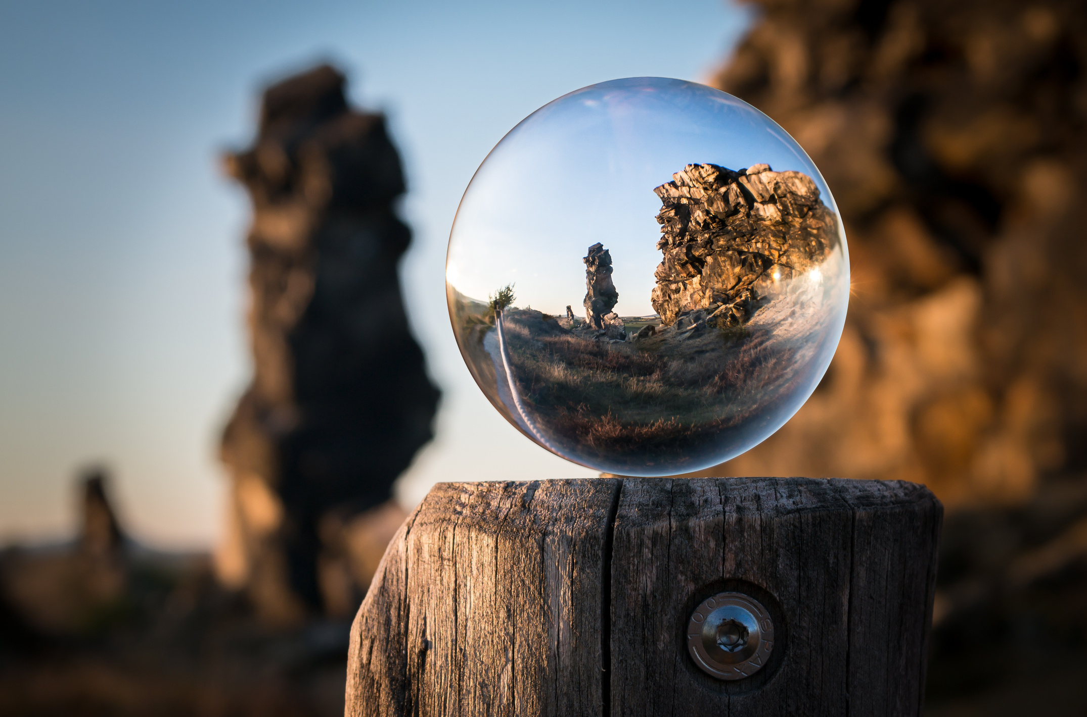 Glass Ball Mirroring the Stone Formations